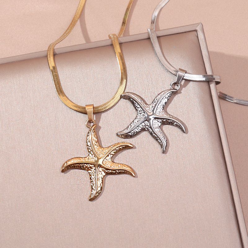 Collar con colgante de estrella de mar fabricado en acero inoxidable._voghion.com