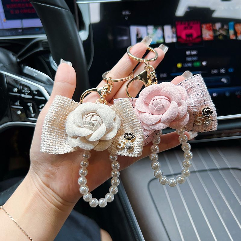 Personalized pearl chain, small fragrance bow, camellia creative and exquisite car keychain, bag decoration, female_voghion.com