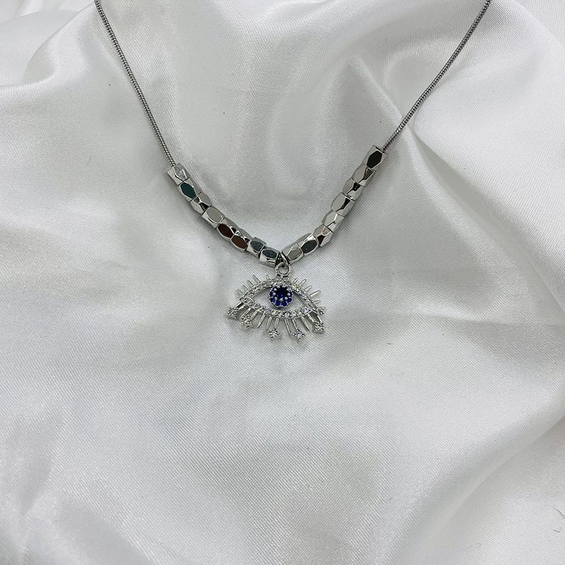 Collana con ciondolo a forma di occhi di zircone di alta qualità e catena a forma di osso, design unico e di lusso alla moda del 2022_voghion.com