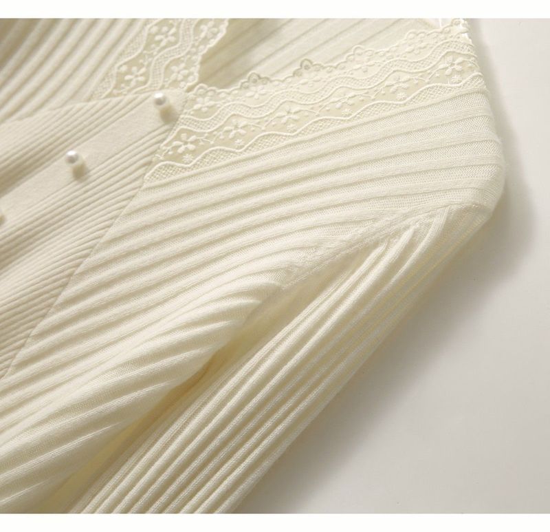 Vêtements pour femmes Chemise à col en V avec nouveau pull de printemps et d'automne Haut de style occidental en dentelle tricotée pour le printemps et l'automne_voghion.com