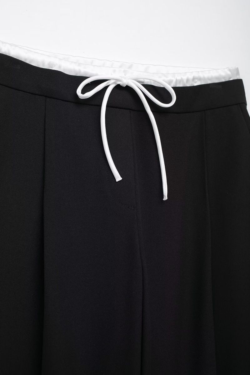 Pantaloni a gamba larga a doppio strato in stile casual, primavera 2024 da donna_voghion.com