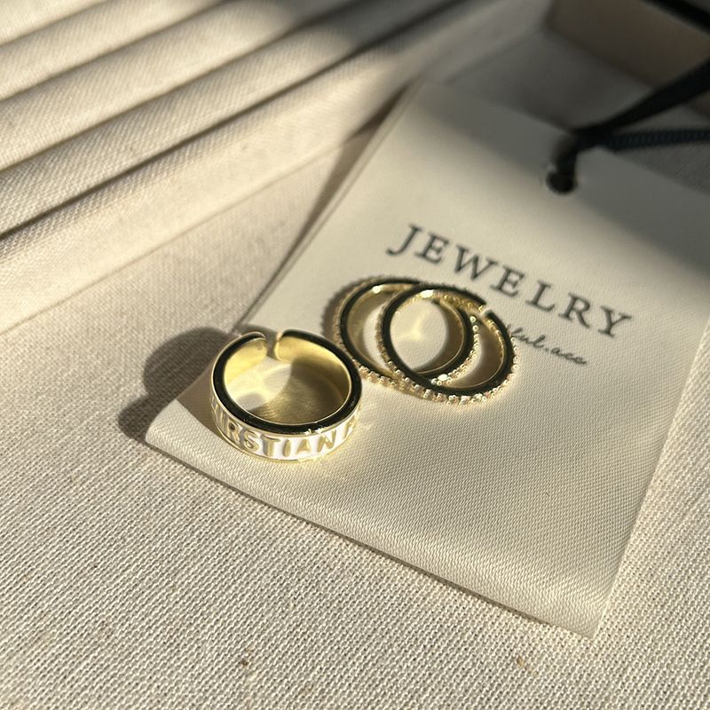 Nuovo anello di diamanti a tre pezzi impilabile aperto personalità alla moda temperamento versatile anello di alta qualità con lettera da donna_voghion.com