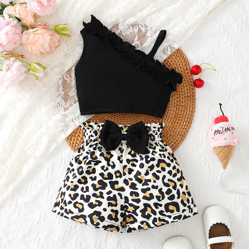 Esclusivamente per i nuovi arrivi transfrontalieri, set di top e pantaloncini con stampa leopardata per neonata, in tinta unita e molto venduto._voghion.com