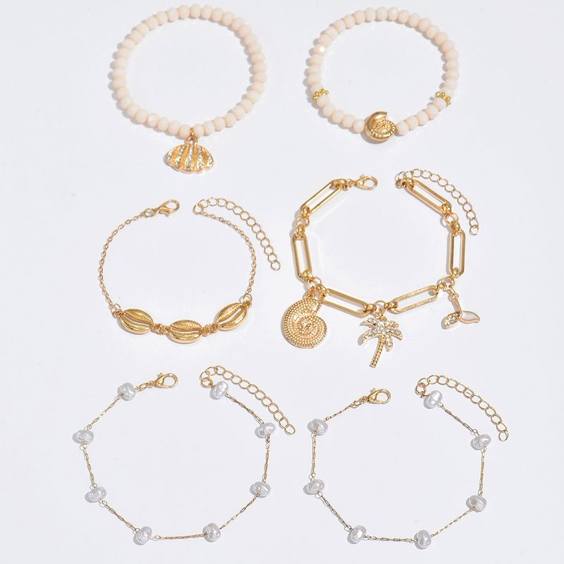 Bohemian Bracelet Wholesale European And American New Holiday Style Rice Beads Alloy Conch Shell Pendant Bracelet Set_voghion.com