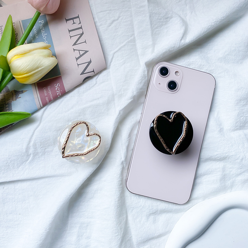 Marble patterned mobile phone airbag bracket, electroplated hollow heart back sticker, adhesive, stretchable and stable_voghion.com