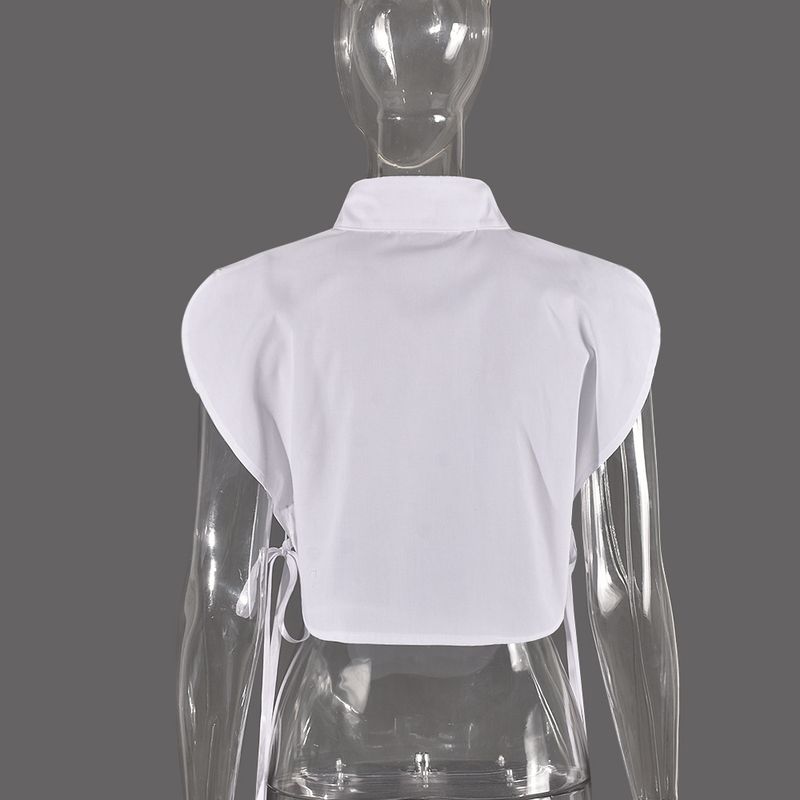 Camicia da donna con lacci senza maniche e cuciture a vista sull'ombelico_voghion.com