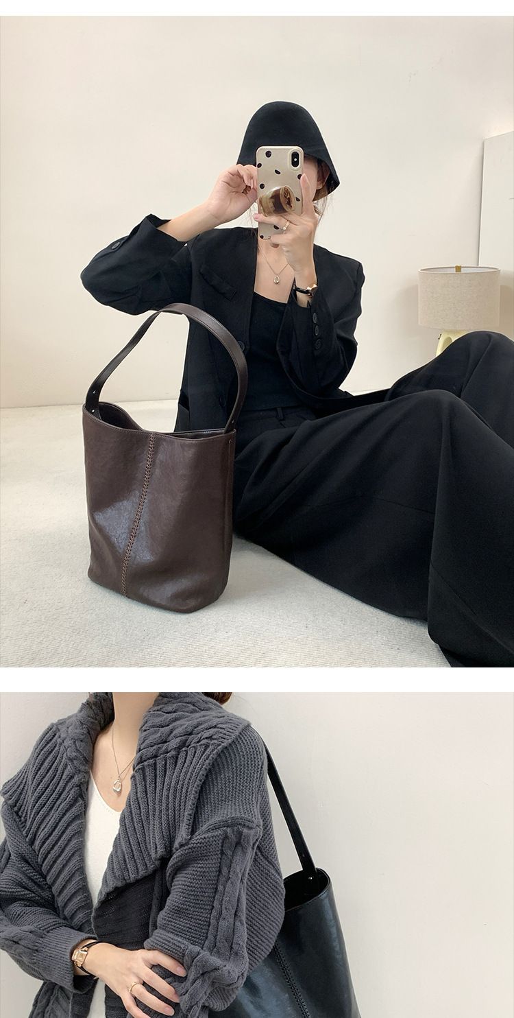 Hoofdlaag koeienhuid emmer 2024 nieuwe minimalistische stijl handgemaakte gestikte leren tas, enkele schouder crossbody tas voor_voghion.com