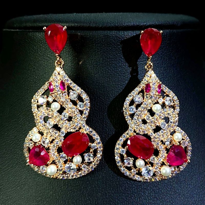 Orecchini a forma di zucca rossa con sangue di piccione in zircone per donna, lusso leggero, alta personalizzazione, serpente artificiale alla moda per Capodanno_voghion.com