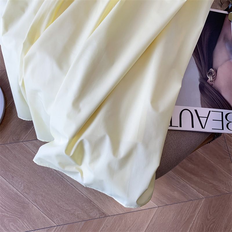 Gonna gialla da donna, a vita alta, a trapezio, sottile, di media lunghezza, con grande gonna a ombrello._voghion.com