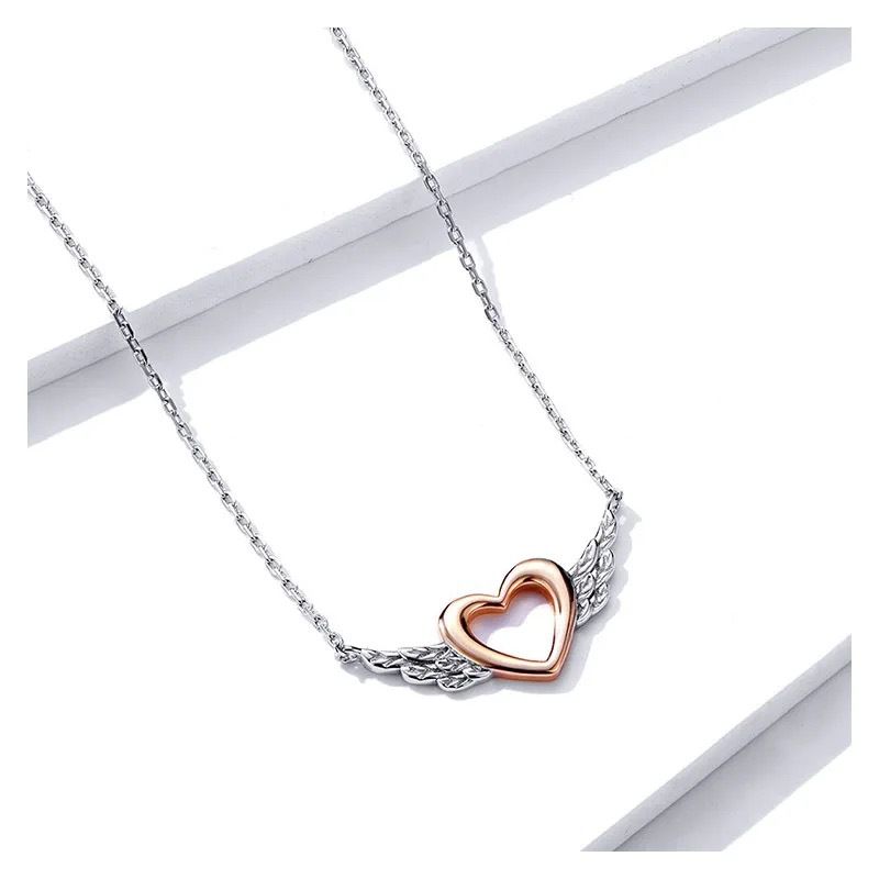 Collana bicolore con ali d'angelo cave a forma di cuore semplice e alla moda in argento_voghion.com