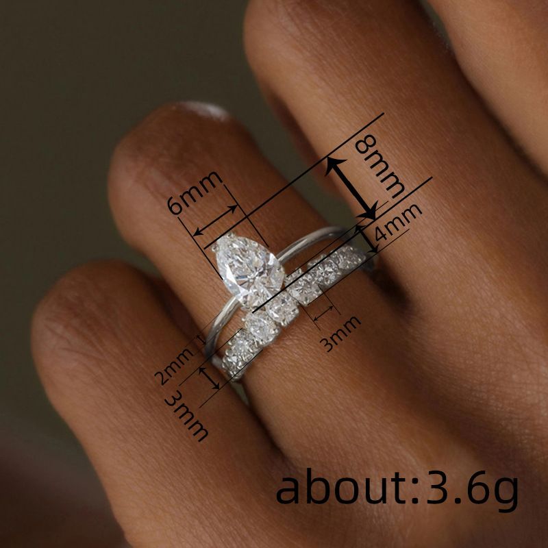 L'anello in zircone a forma di lacrima di Cao Shi è alla moda e squisito, adatto per anelli di fidanzamento e anelli popolari._voghion.com