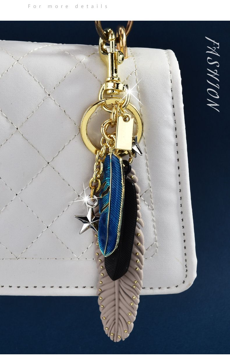 Neue Ankunft Exquisite sternförmige Feder Schlüsselanhänger Mode-Accessoires Elegantes Design Schlüsselanhänger Anhänger_voghion.com