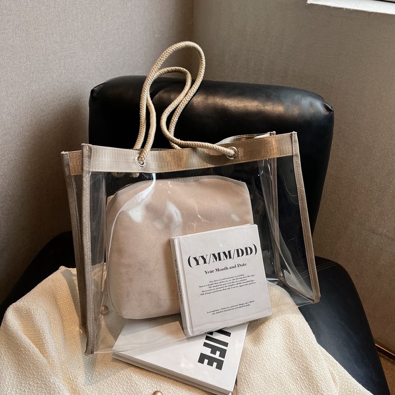 Questa primavera e questa estate, questa borsa a tracolla trasparente di grande capacità per le donne, 2025, è un'elegante borsa tote in gelatina._voghion.com