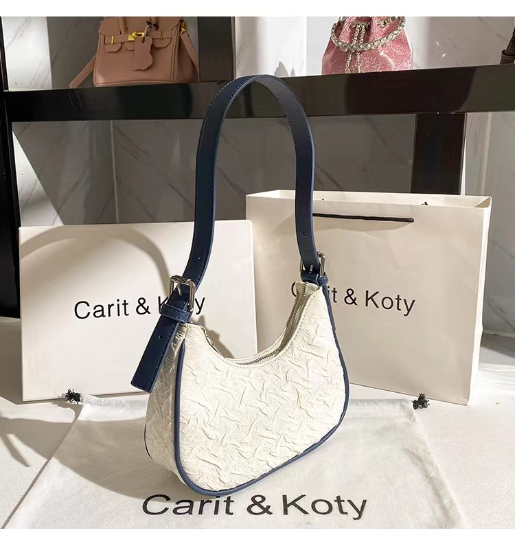 Hong Kong MrCKJHOSEL Beliebtes Wrinkle dieses Jahr für Frauen Xia Xiaozhong Design Crescent Unterarmtasche One Shoulder_voghion.com