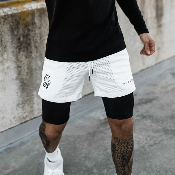 Pantaloncini sportivi alla moda a doppio strato per l'allenamento da uomo falso in due pezzi da basket in esecuzione fitness capris_voghion.com