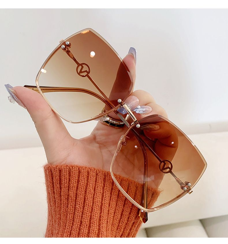 Gafas de sol nuevas sin marco con borde de corte para mujer, de moda, de metal, con marco grande, con luz degradada, para conducir, viseras solares_voghion.com