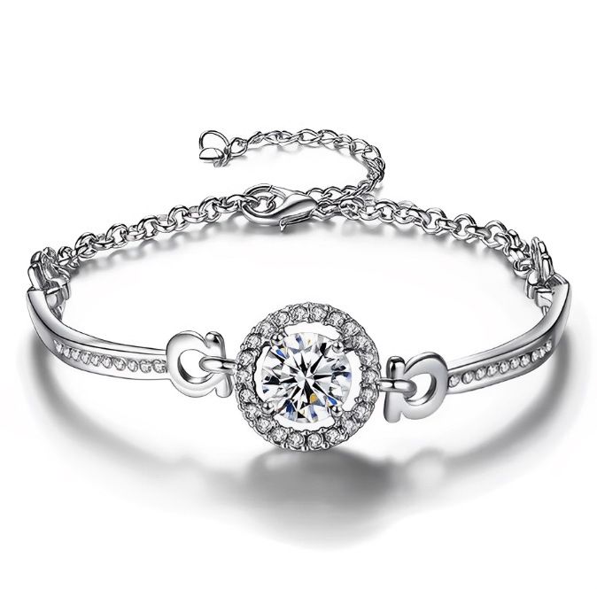 Braccialetto elegante all'ingrosso con zirconi di cristallo per donne, nuovo stile coreano per studenti, con cuori semplici intarsiati e otto frecce_voghion.com