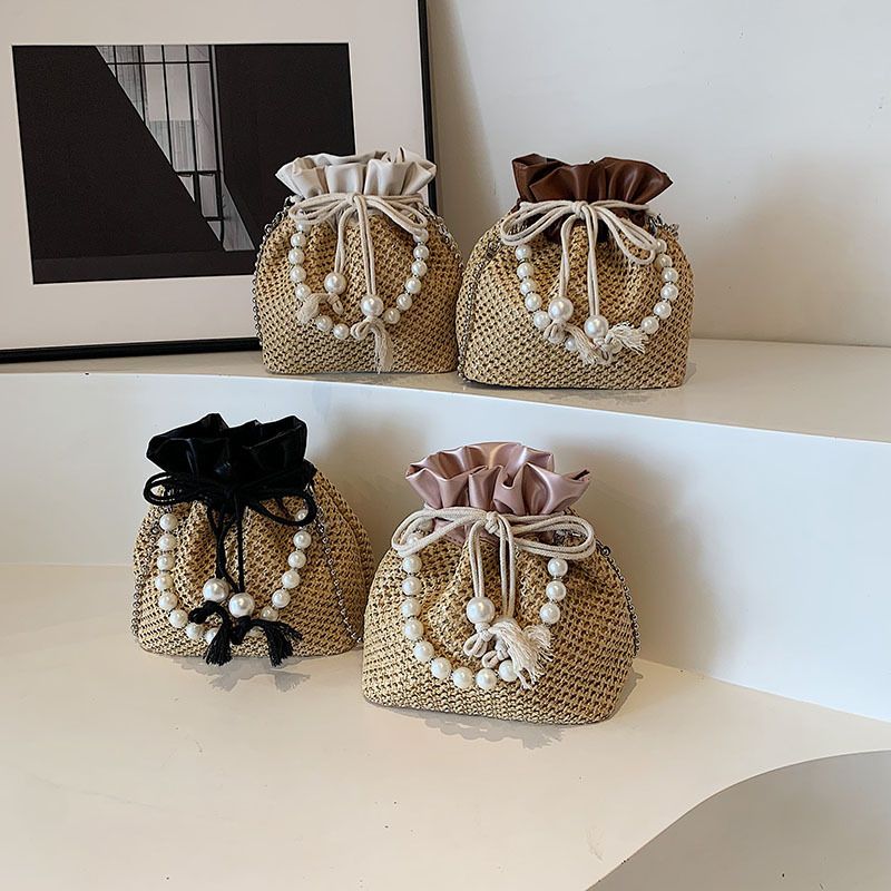 Sac bandoulière tendance en perles pour femme cette année, nouveau sac seau décontracté en paille tissée avec cordon de serrage_voghion.com