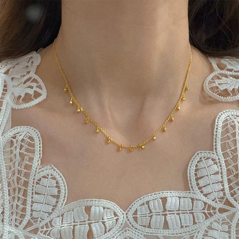 Negozio di oro con collana di piccole perle d'oro perle esplosive femminili oro luce lusso nicchia alto senso catena_voghion.com