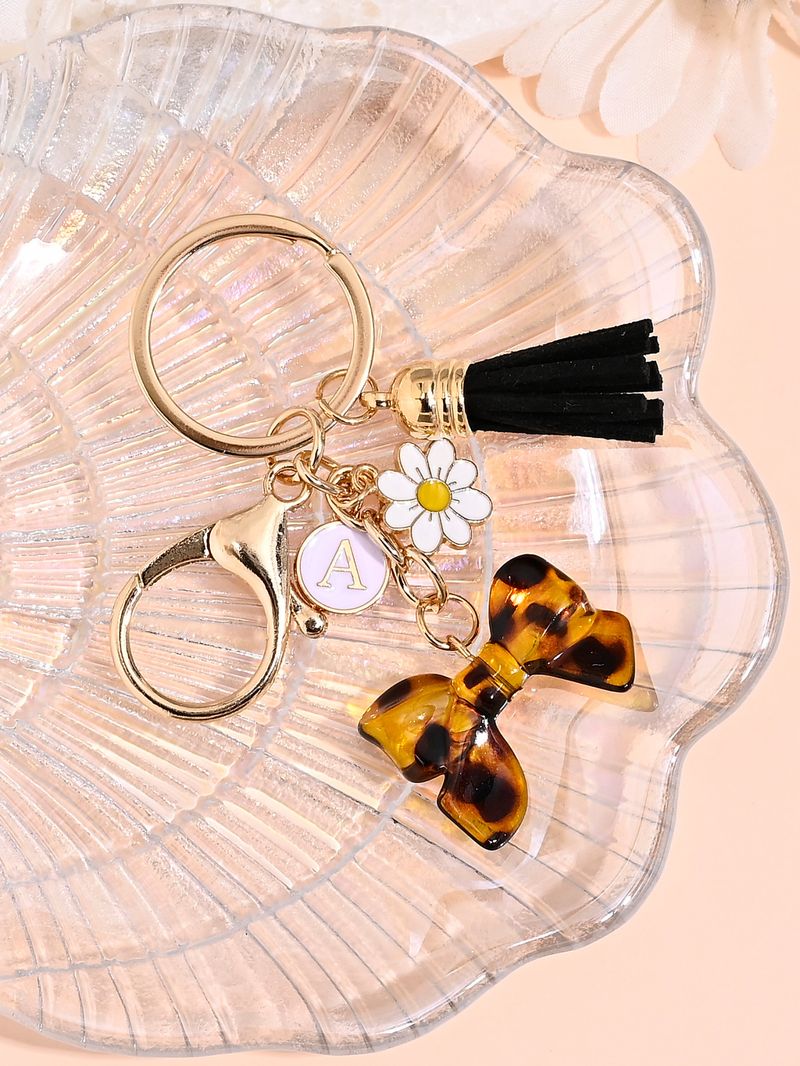 Porte-clés avec pompon et nœud papillon imprimé léopard, nouvelle mode, mignon, pendentif pour sac_voghion.com