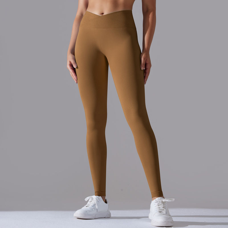 Pantaloni da yoga a nove punti da fitness da donna, lavorati a maglia, traspiranti, in tinta unita, a vita incrociata, color pesca, senza cuciture_voghion.com