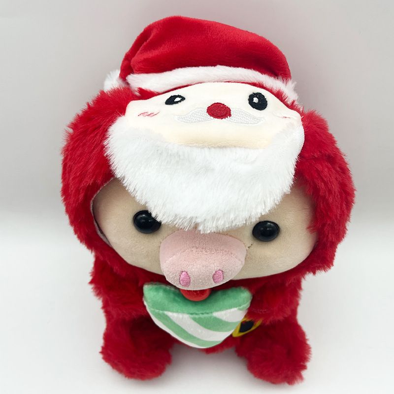 Adorabile peluche a forma di maialino natalizio con disegni di Babbo Natale e renne per una gioia natalizia_voghion.com