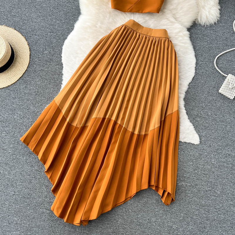 Abito da donna in due pezzi per gonna a pieghe irregolare con top a tubino in colore a contrasto stile estivo_voghion.com