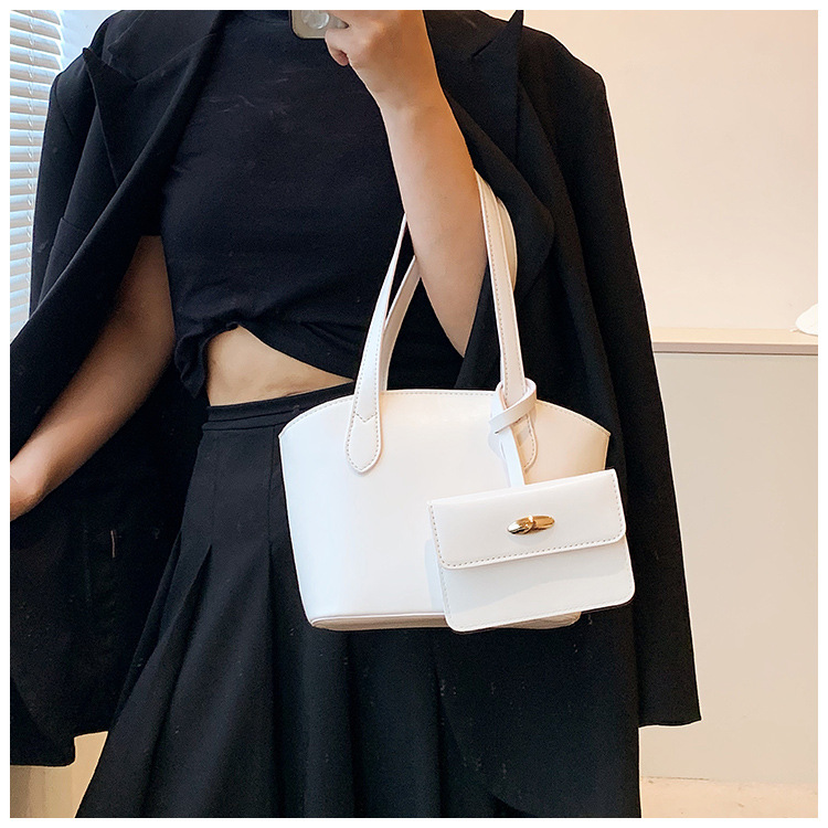 Borsa piccola portatile di moda estiva nuova borsa a secchiello casual semplice da donna 2023 borsa per ascelle suocera con trama di nicchia_voghion.com