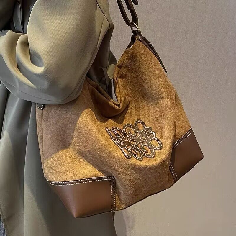 Nuova borsa da viaggio per pendolari del 2025, grande capacità, per donne, in pelle scamosciata, borsa a tracolla versatile di Niche_voghion.com