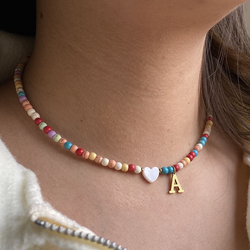 Vendita calda transfrontaliera in acciaio inossidabile oro 26 lettera inglese ciondolo conchiglia amore colore misto turchese collana fai da te clavicola_voghion.com