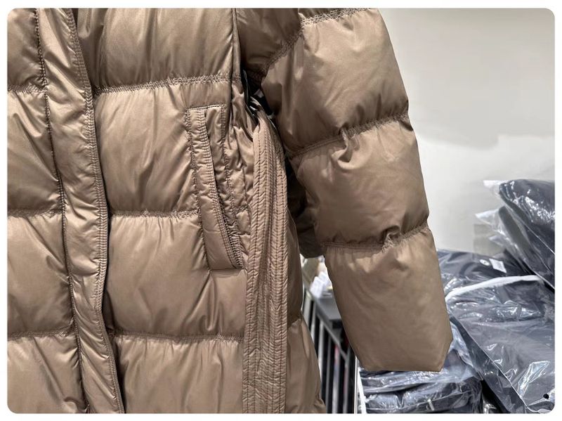 Dames lange gewatteerde jas met witte eendenveren, winterse oversized donsjas met capuchon, taille-definiërende riem, warme jas tot op de knie_voghion.com