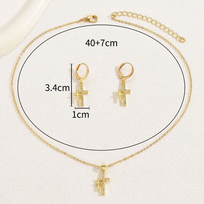 Conjunto de brincos de colar de cruz simples de nicho com design de zircônia incrustada de luxo e corrente de clavícula_voghion.com