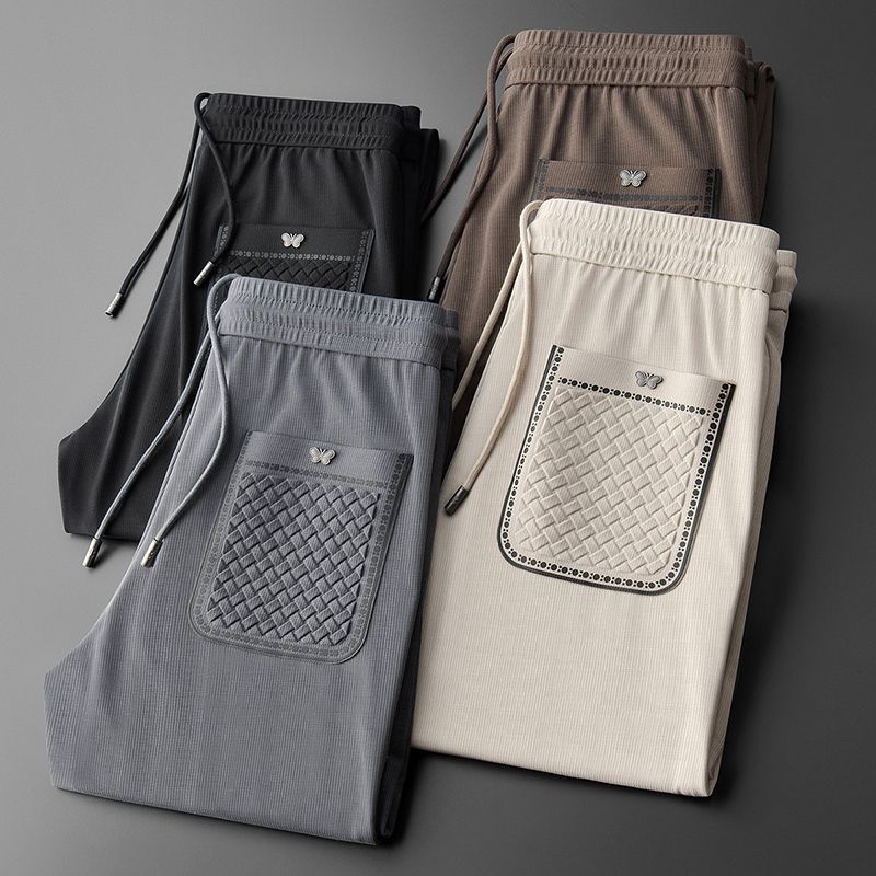 Vêtements pour hommes légers de luxe printemps et été pantalons de sport décontractés fins pantalons de survêtement à la cheville brodés de marque tendance pour hommes pantalons longs polyvalents amples_voghion.com