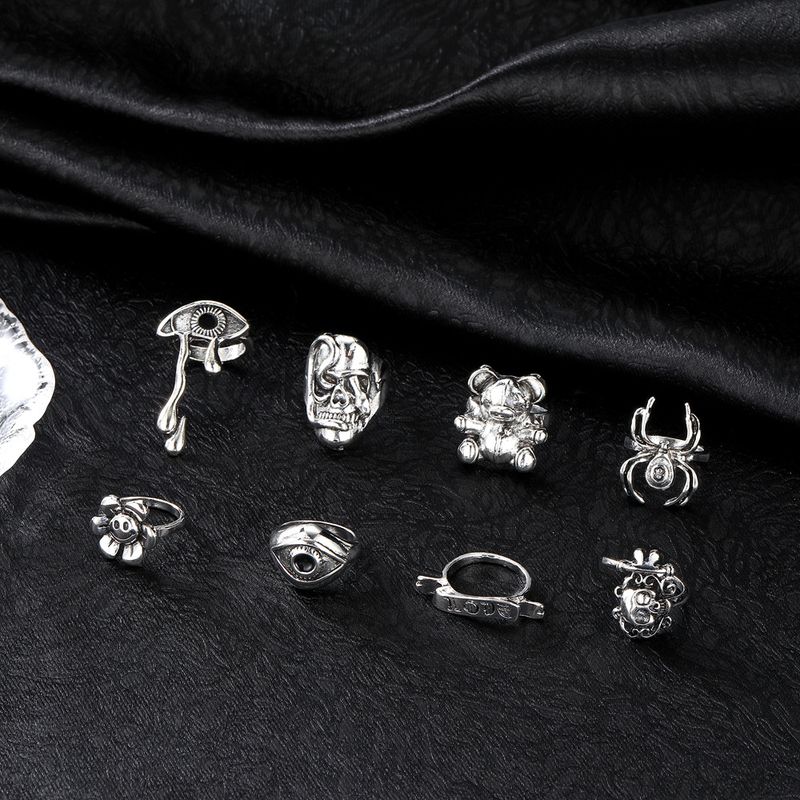 Personalisiertes übertriebenes Augen-, Tränen-, Spinnenpuppen-, Totenkopf-, lächelndes Gesicht- und Blumenset mit 8 Ringen_voghion.com