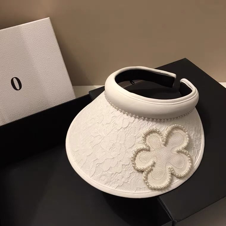 Top vuoto in stile forcina in pizzo jacquard coreano per viaggi estivi, parasole leggero con fiori di perle che riduce l'età e sole_voghion.com