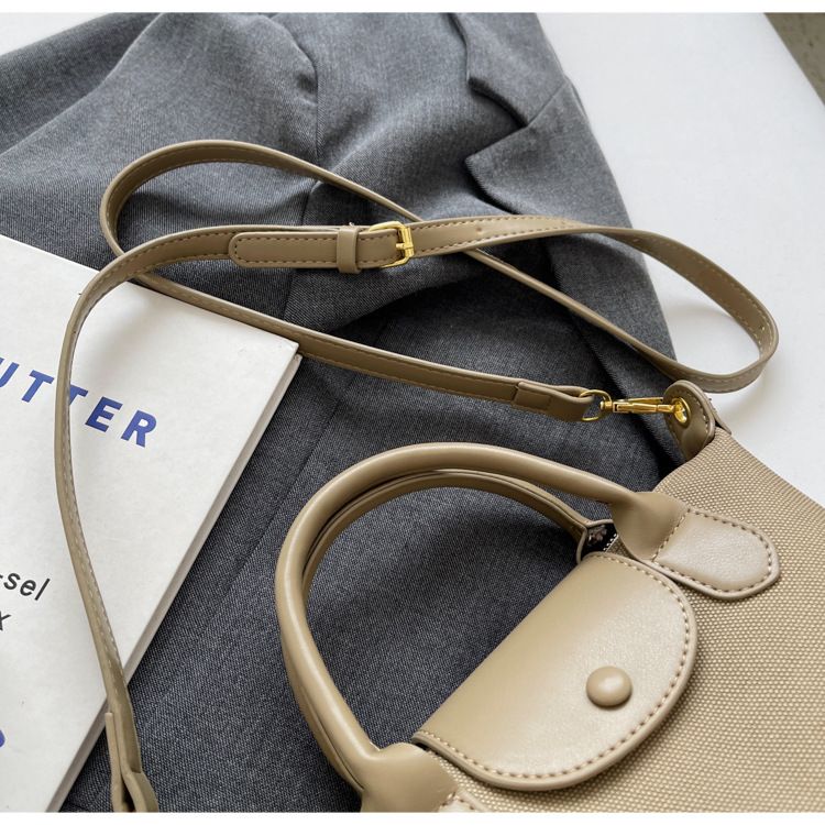 Borse da donna La borsa a forma di gnocco semplice più popolare di quest'anno, la nuova borsa a tracolla a tracolla Xiang Longbags di alta qualità con trama a mano_voghion.com
