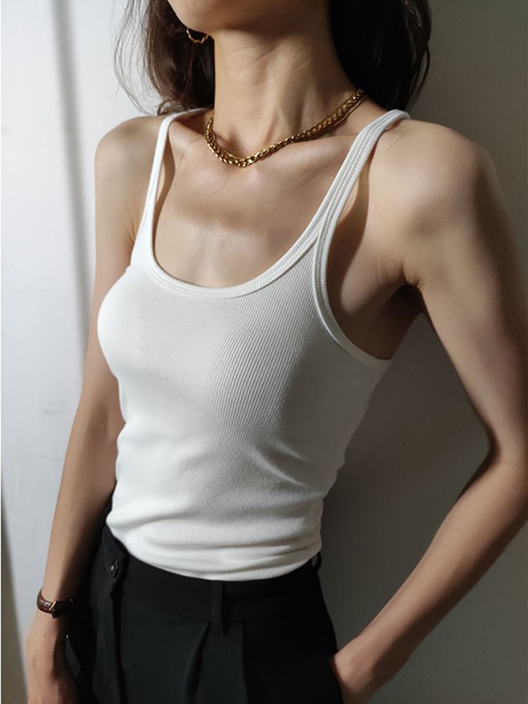 Canotta attillata in maglia con spalline sottili bianche per abbigliamento estivo da donna_voghion.com