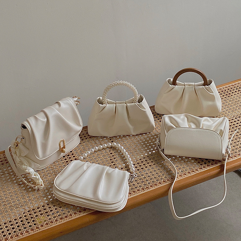 2024 Mini borsa a tracolla singola a spalla singola per telefono cellulare piegata alla moda da donna piccola perla_voghion.com