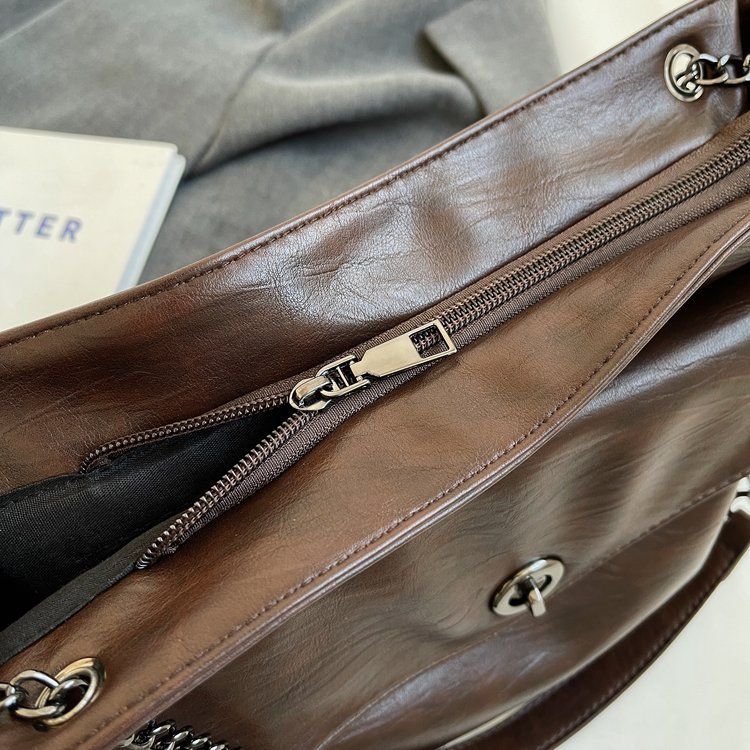 Our women's bag is not just an accessory, but also a symbol of your confidence. Shoulder bag, zipper, stitching PU_voghion.com
