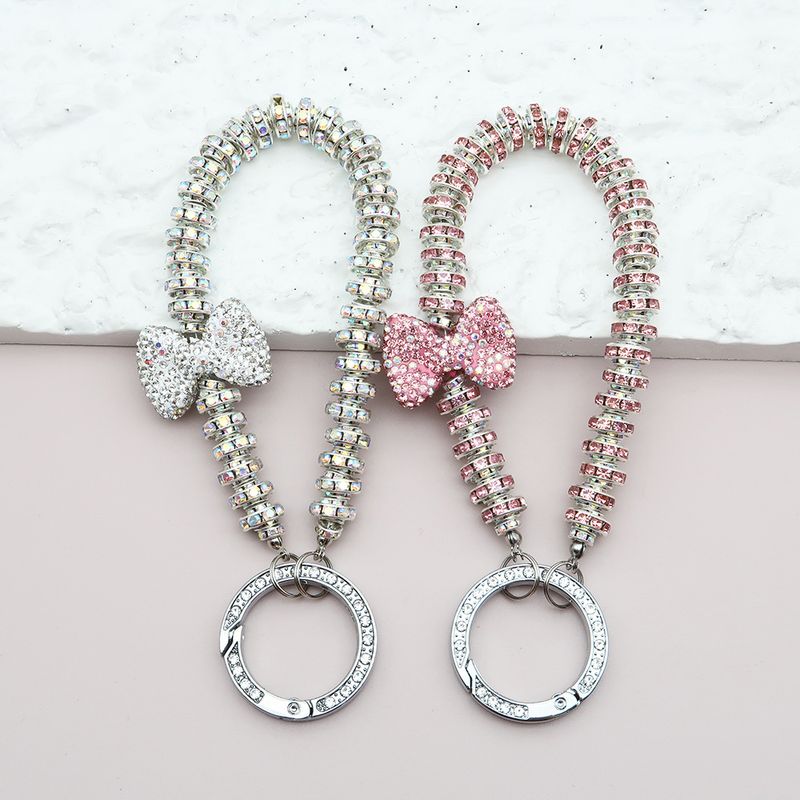 Dames licht luxe klei vol diamanten strik sleutelhanger anti-verlies diamanten ring sleutelhanger armband diamanten mobiele telefoon hanger_voghion.com