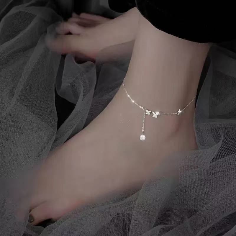 Cavigliera estiva in argento con nappa a farfalla e fiore per donna, 2025, nuova moda, personalità di nicchia, stile minimalista, catena per piedi_voghion.com