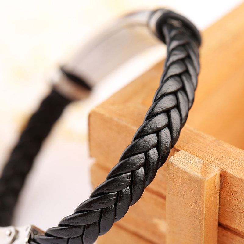 Bracciale da uomo in acciaio inossidabile con incisione in pelle di titanio intrecciata per eventi espositivi_voghion.com