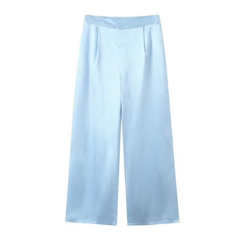 Completo top con nodo a farfalla e pantaloni in raso da donna estate 2024_voghion.com