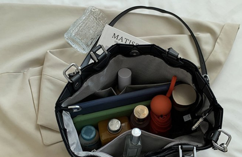 Bag women's 2023 new fashion One Shoulder Messenger Bag solid color geometric pattern Handbag folding bucket bag_voghion.com