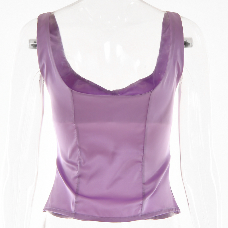 La camicetta da donna con colletto quadrato, cavezza, bottoni, senza maniche, senza schienale, può essere coperta con un gilet_voghion.com