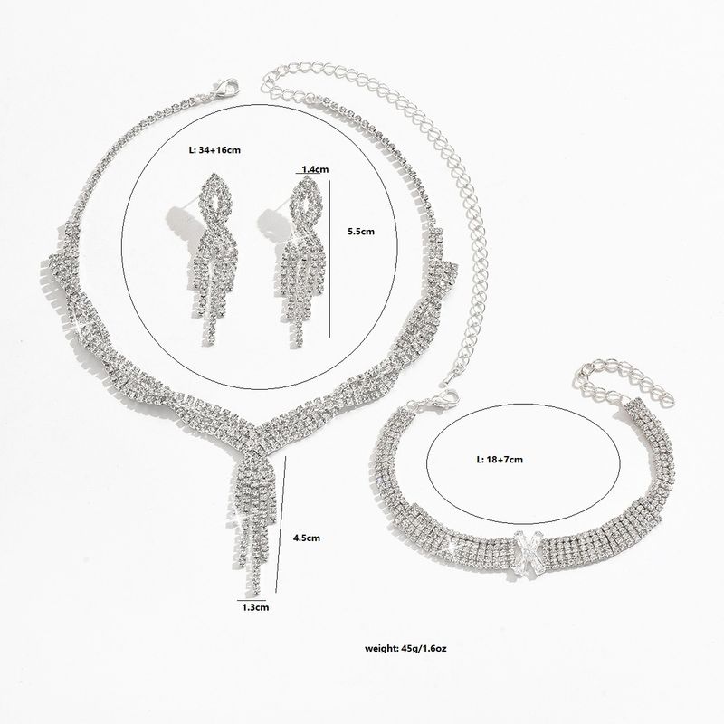 Conjunto de collar, pendientes y pulsera de cuatro piezas para mujer._voghion.com