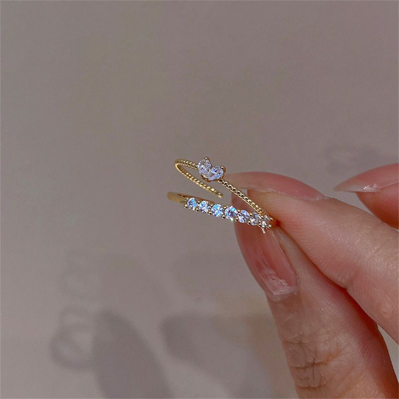 2025 Nuovi arrivi 2 pezzi anelli a forma di cuore in cristallo delicato ed elegante per donne e ragazze color oro, set di anelli per dita delicati e impilabili_voghion.com