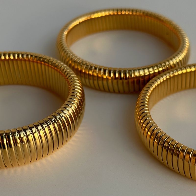 Bracciale Gypsy elastico in acciaio al titanio placcato oro vero_voghion.com