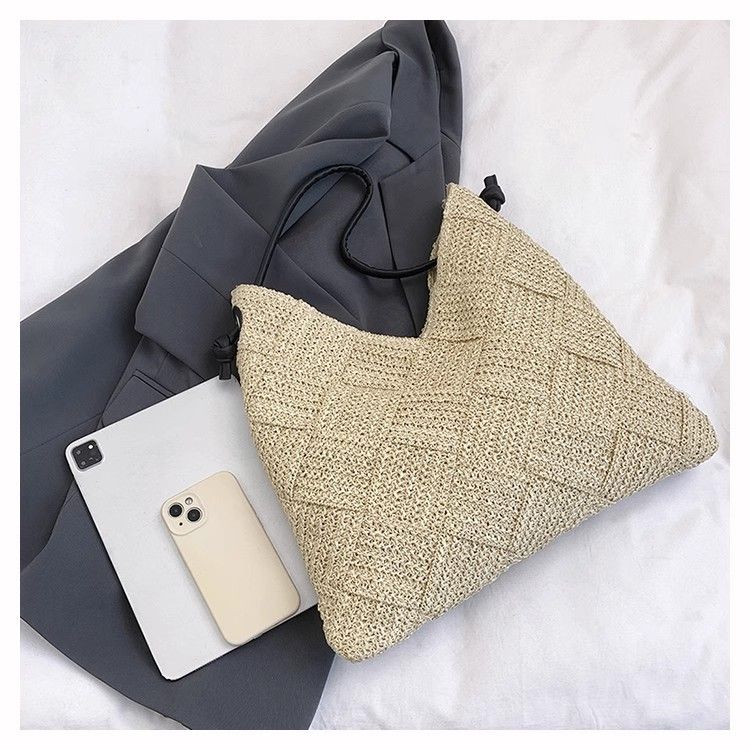 Niche Design 2025 High-End Hollow Shoulder Lazy Style Handheld Straw Vacation Beach Bag For Women_voghion.com