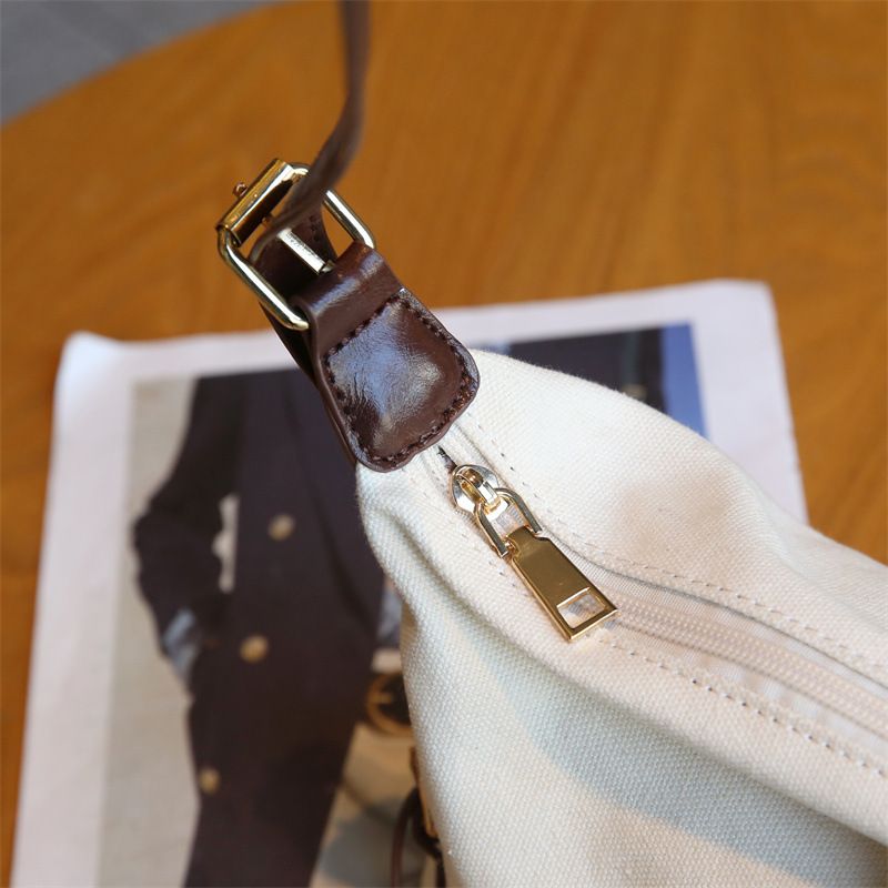 Canvas Dumpling Fashion Shoulder Splicing Small Design Women's Bun Versatile Commuting Ins New Style_voghion.com